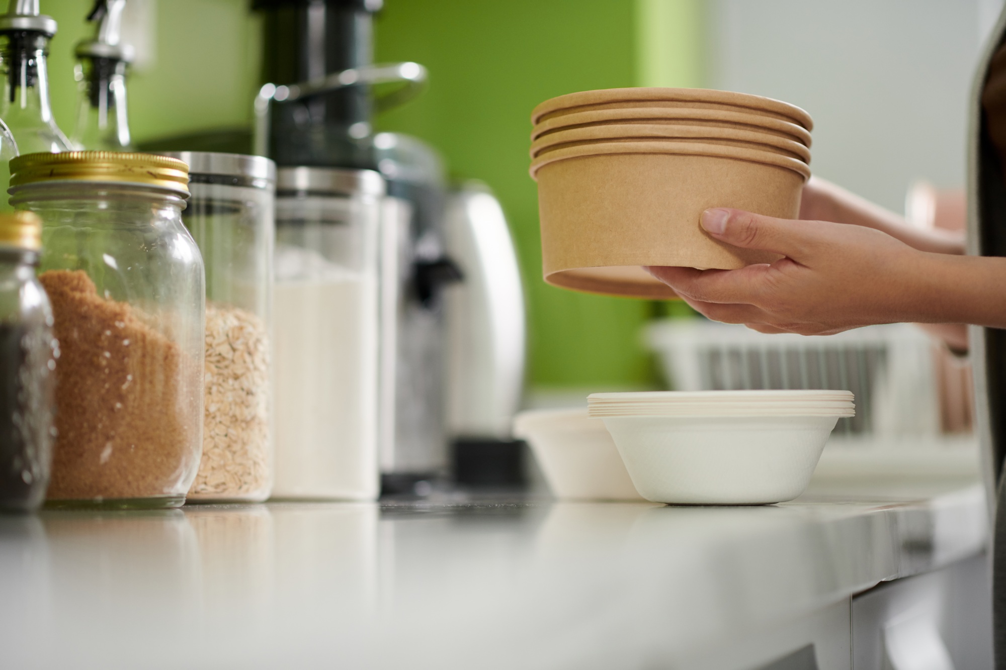 Woman Taking out Disposable Bowls