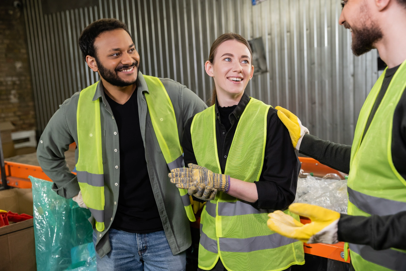 cheerful-sorter-in-protective-vest-and-gloves-talk-2024-11-10-12-33-24-utc